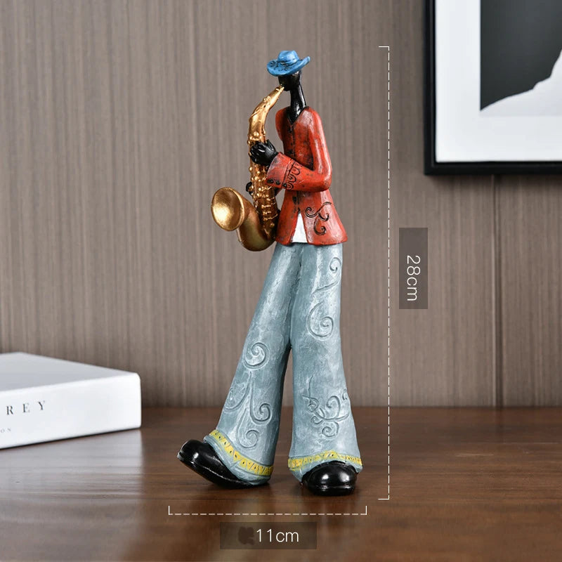 Statue of a musician playing a saxophone with measurements on a wooden surface.