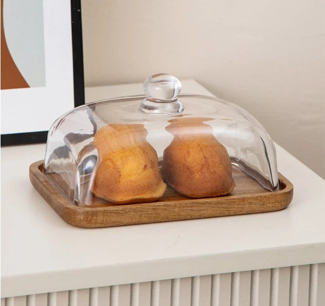 Glass pastry display dome with bamboo serving base