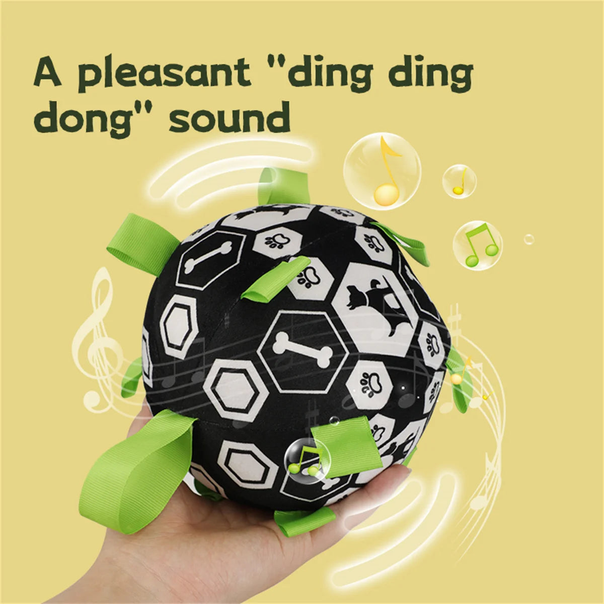 Black and white textured ball with green accents held in a hand, on a yellow background with sound wave graphics.