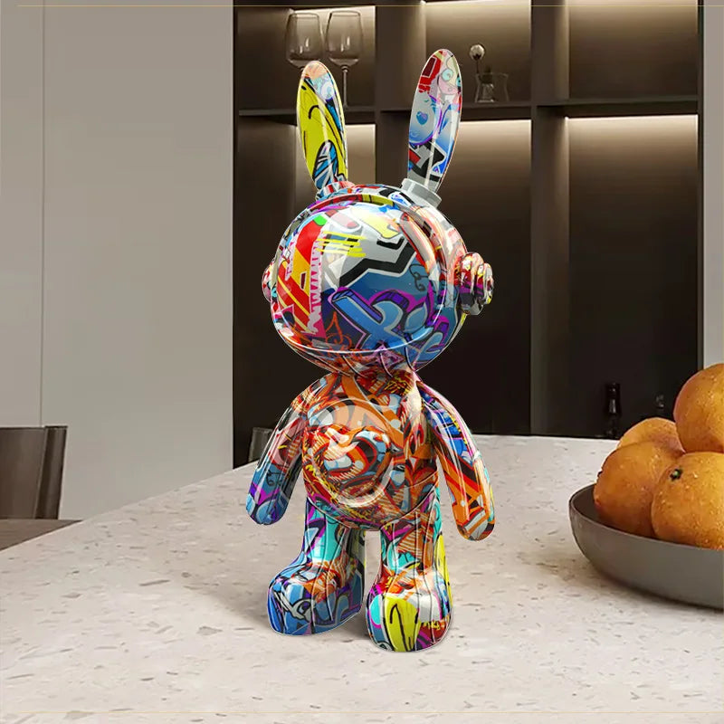 Colorful abstract rabbit sculpture on a table with a modern interior background