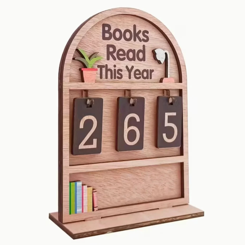 Wooden shelf with 'Books Read This Year' display and number tags.