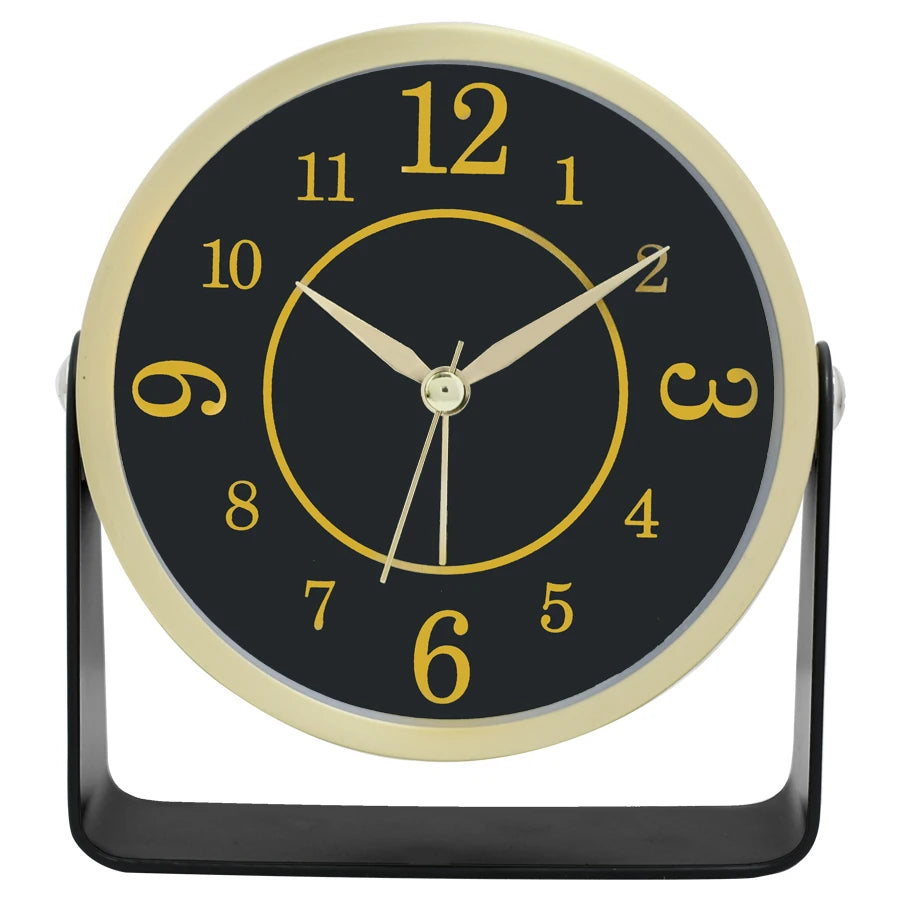 Round clock with black face, gold numbers, and beige rim on a white background