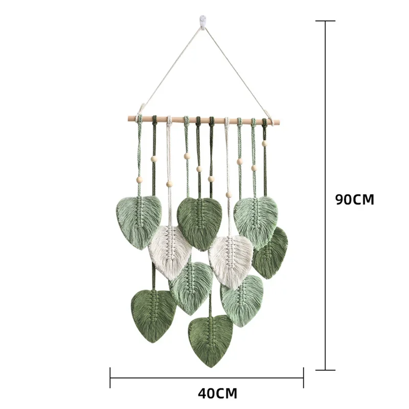 Decorative wall hanging with leaf-shaped elements and measurement details on a white background