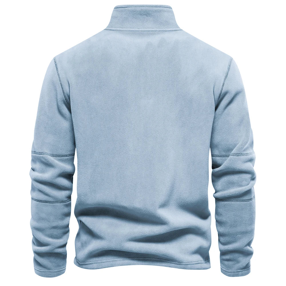 Light blue half-zip sweatshirt on a white background