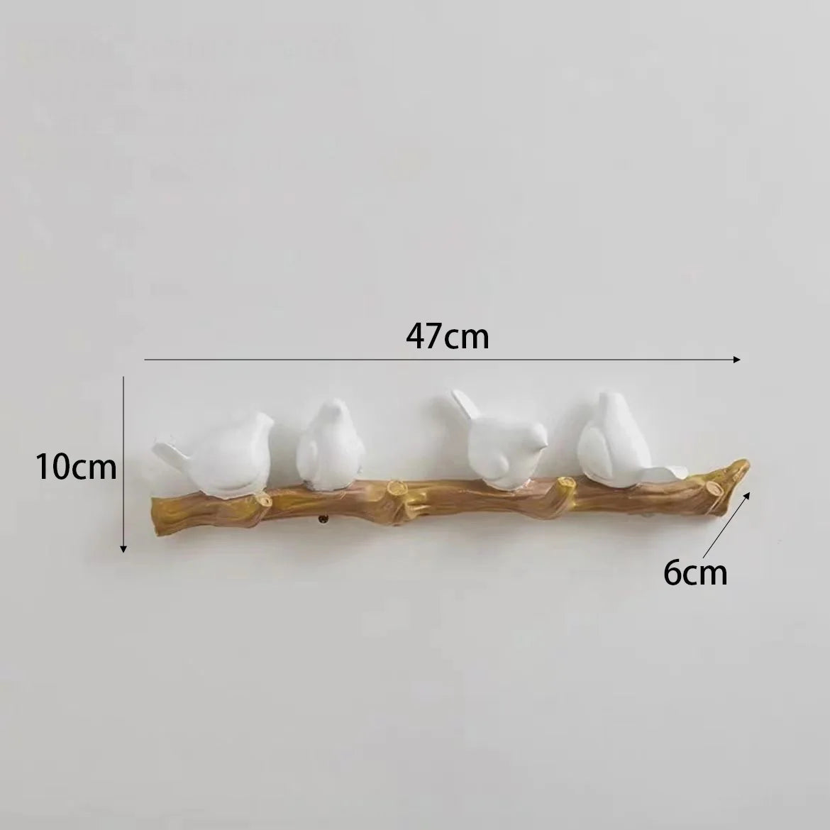 Decorative wall hook with four white birds on a branch, showing measurements on a light gray background.