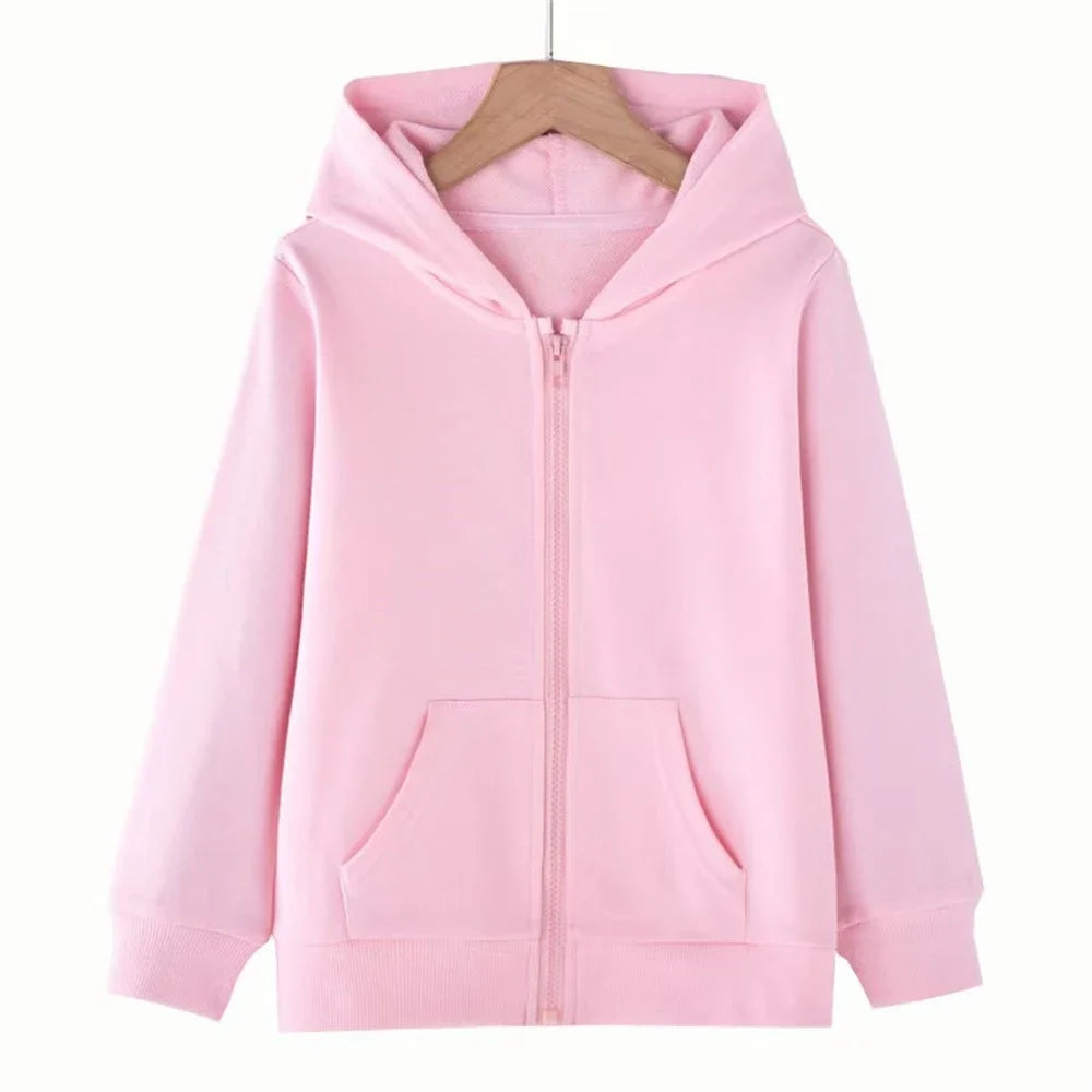 Pink hoodie on a wooden hanger against a white background