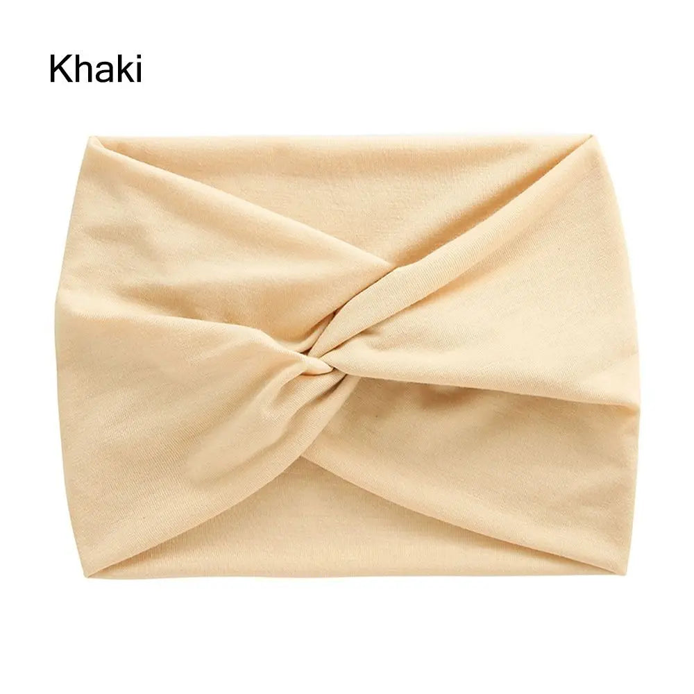 Khaki headband with a knot on a white background