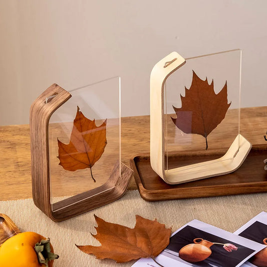 acrylic wooden photo frame displaying print on curved wooden base