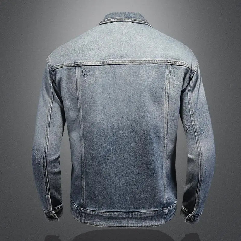 Back View of a Denim jacket n a gray background