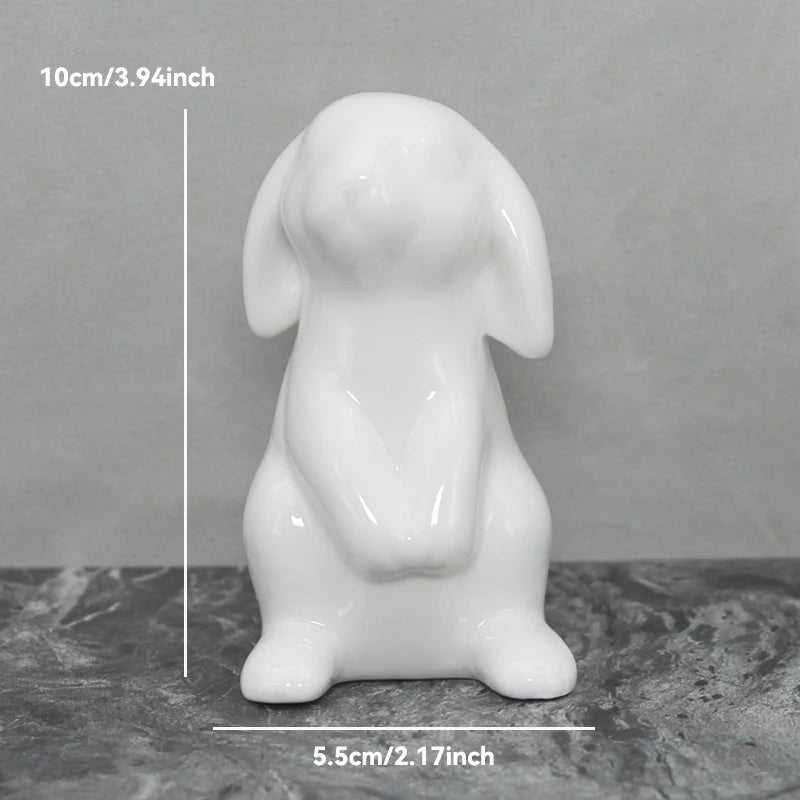 White ceramic dog figurine with measurements on a gray background