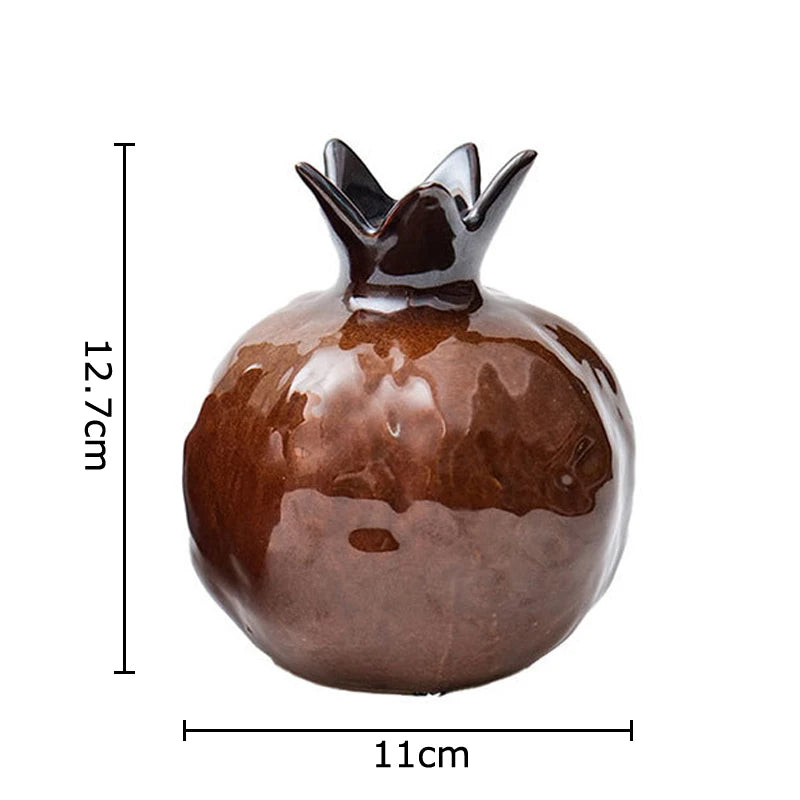 Ceramic pomegranate-shaped vase with dimensions on a white background