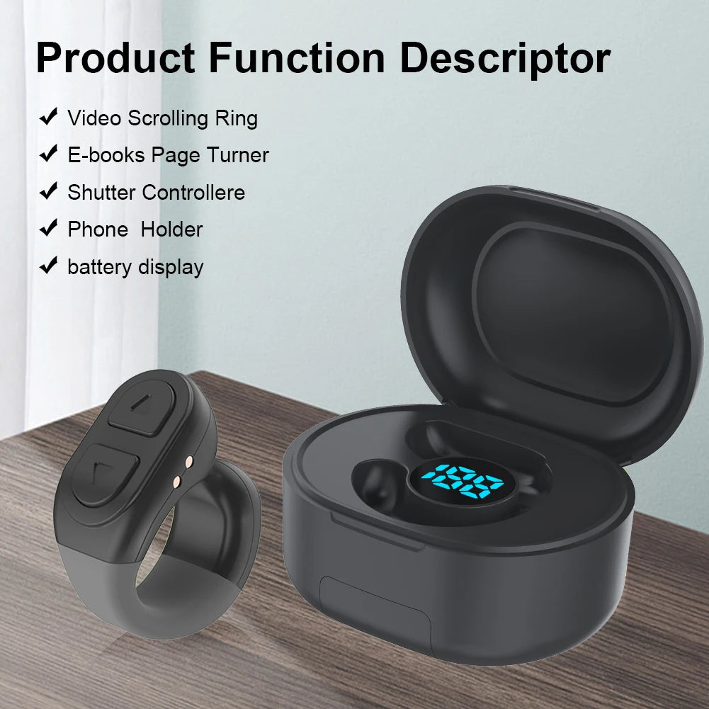 Black ring device with digital display and open case on wooden surface, product function descriptor text above.