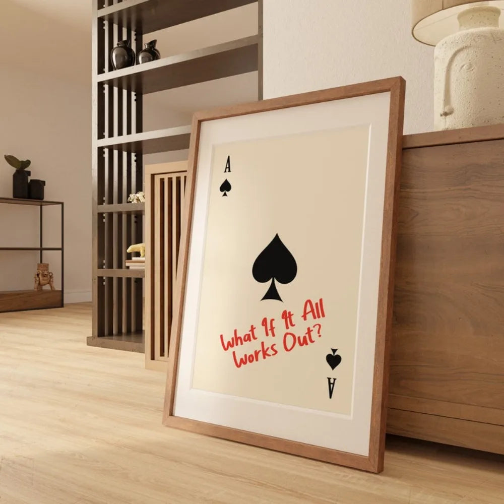 Framed artwork with playing card design and text in a room setting