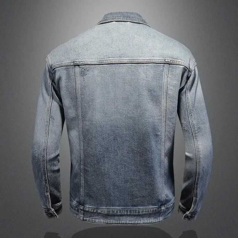 Blue denim jacket on a gray background