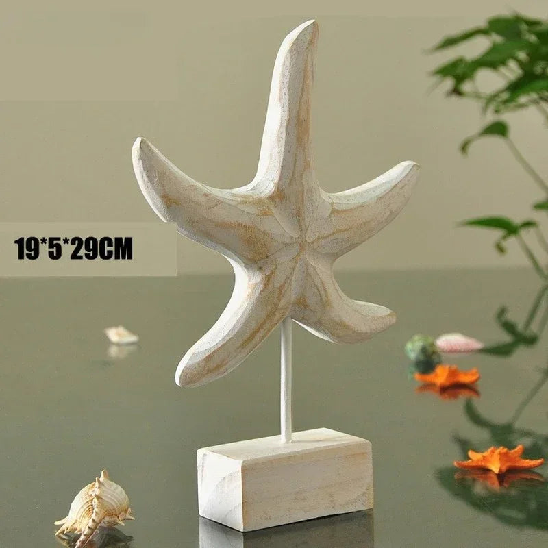 Decorative starfish sculpture on a stand with dimensions displayed, placed on a reflective surface.