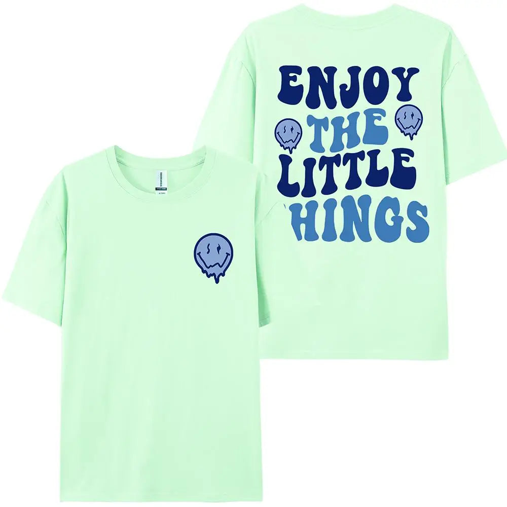 Light green t-shirt with blue text and graphics on a white background