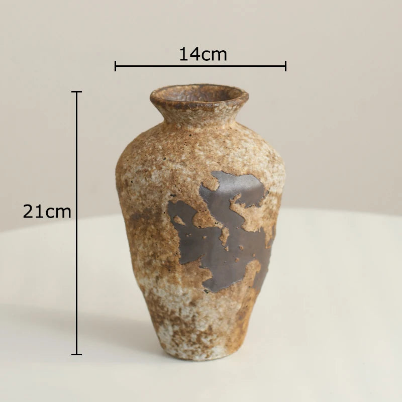 Brown ceramic vase with dimensions indicated on a light background