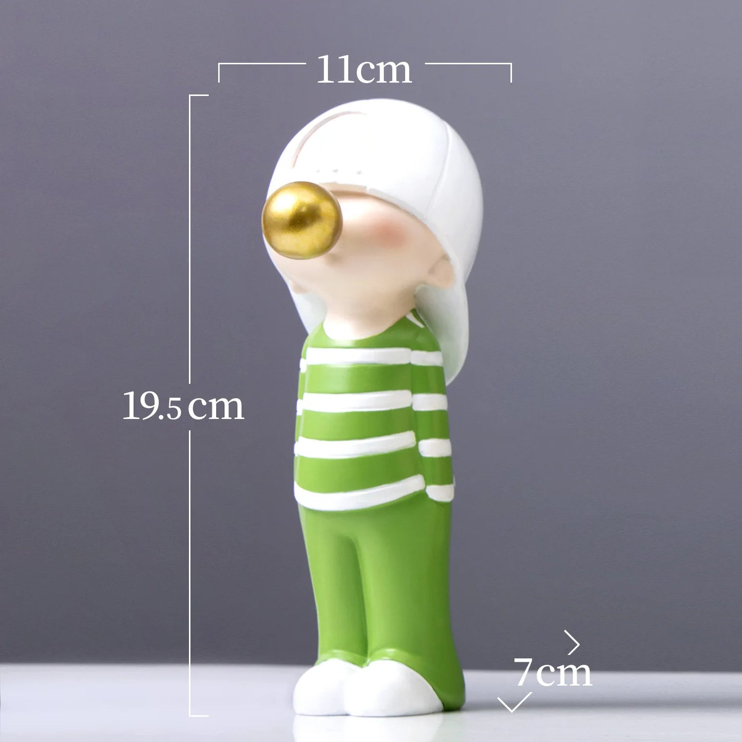 Small figurine with dimensions labeled on a gray background