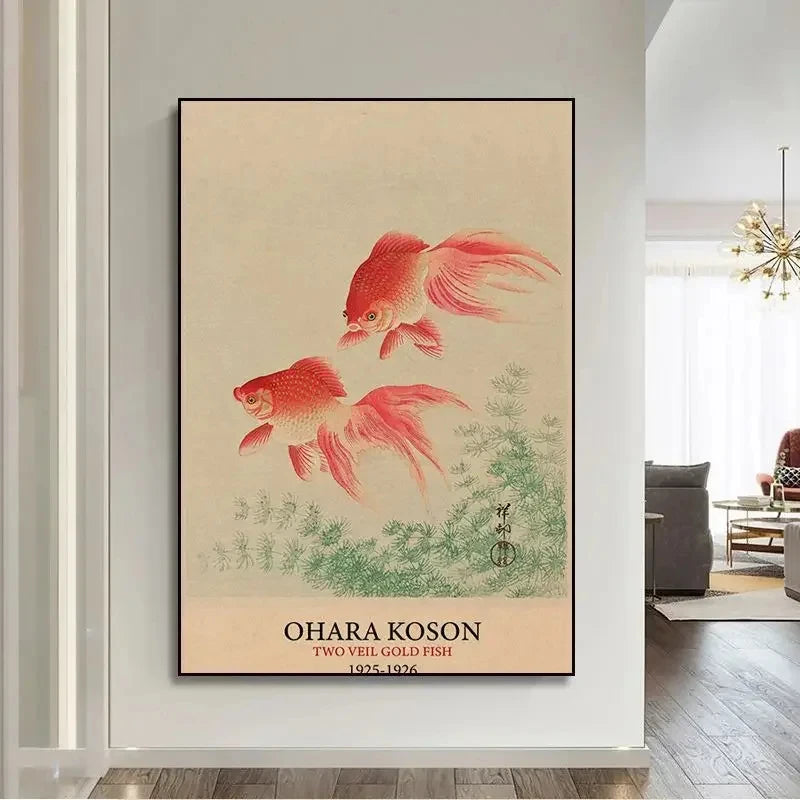 Framed artwork of two goldfish by Ohara Koson on a wall in a modern interior setting.