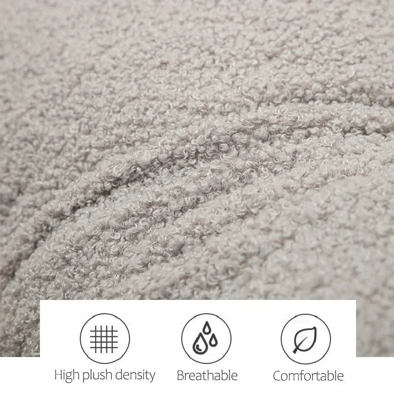 Close-up of textured carpet with icons and text indicating high plush density, breathability, and comfort.