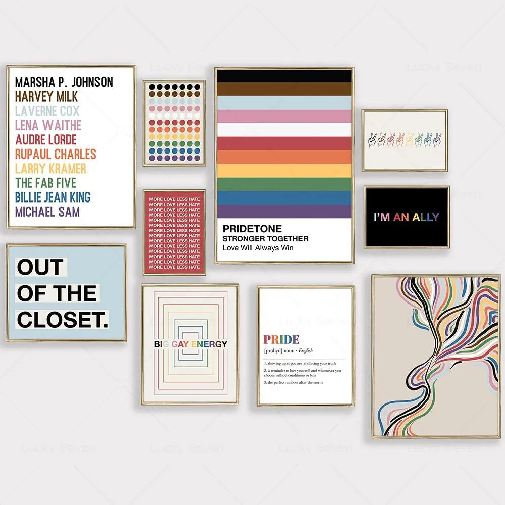 Collection of framed LGBTQ+ pride-themed art on a white wall