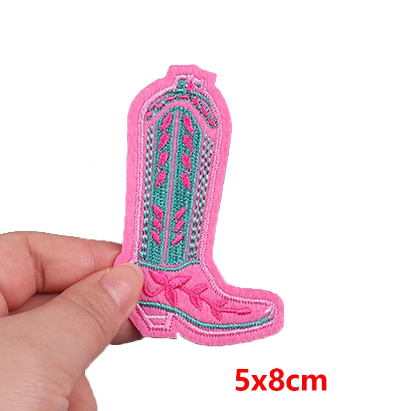 Pink embroidered boot patch held by a hand with dimensions '5x8cm' displayed.