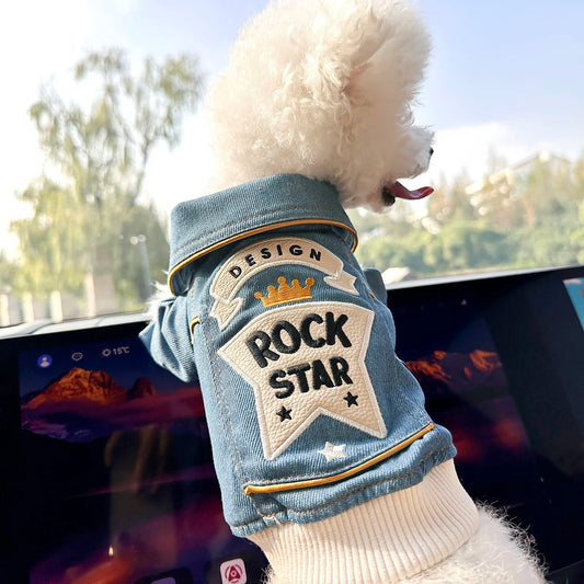 Blue embroidered Rock Star dog jacket worn by a small dog, featuring a denim-style design