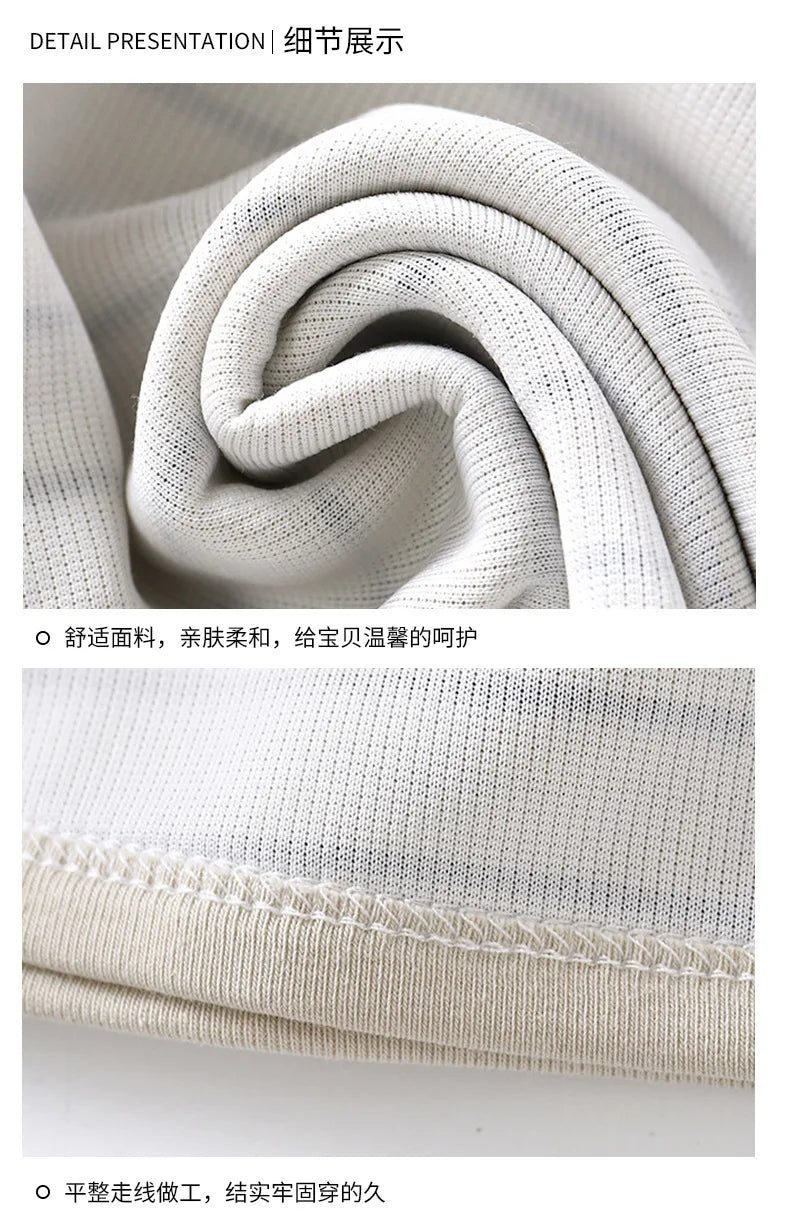 Close-up of textured fabric with visible stitching details.