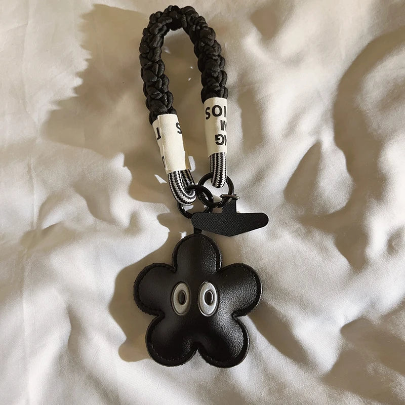 Black flower eye leather bag charm with wrist strap aesthetic pendant