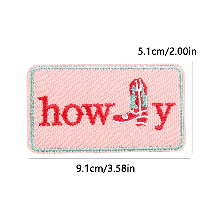 Pink patch with 'howdy' text and boot graphic, shown with measurements on a white background.