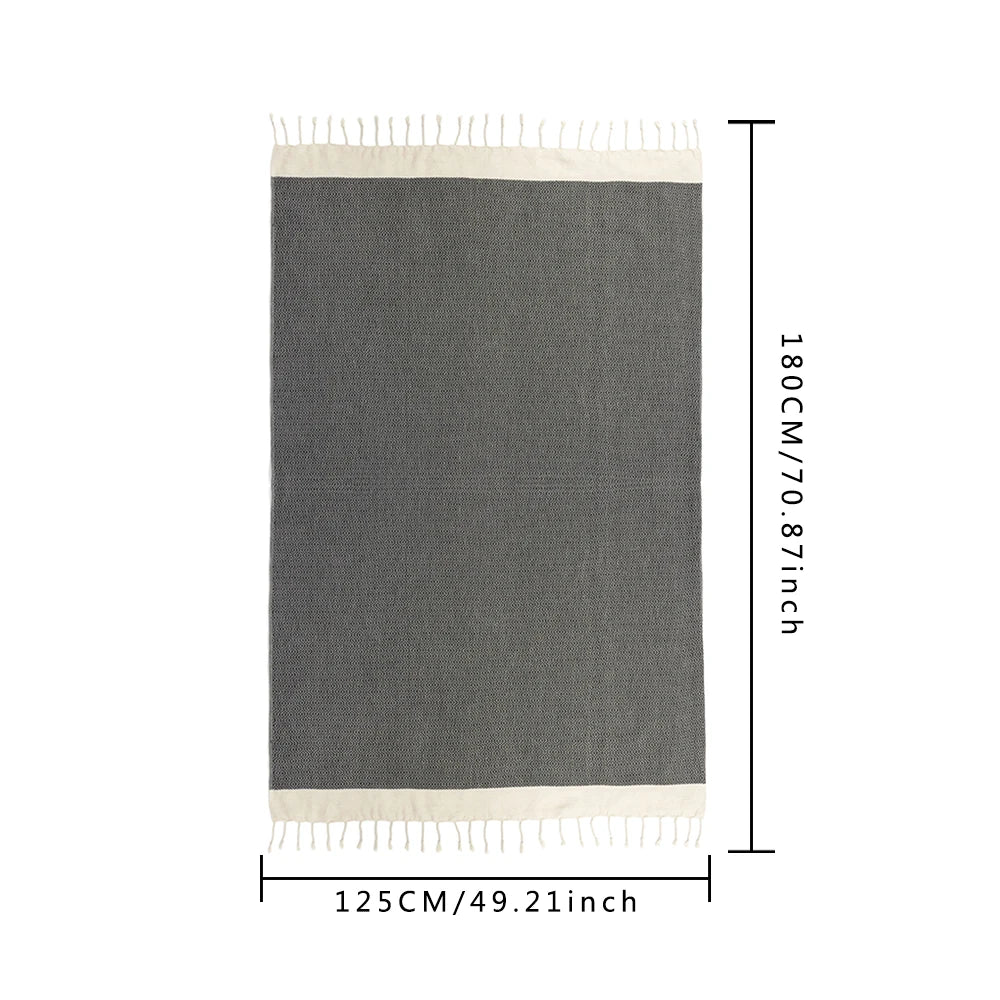 Gray throw with white fringe on a white background, showing dimensions.
