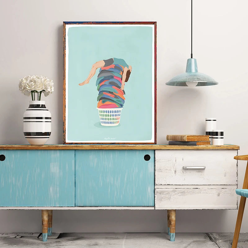 Modern interior with a wooden sideboard, colorful abstract art, and decorative items.