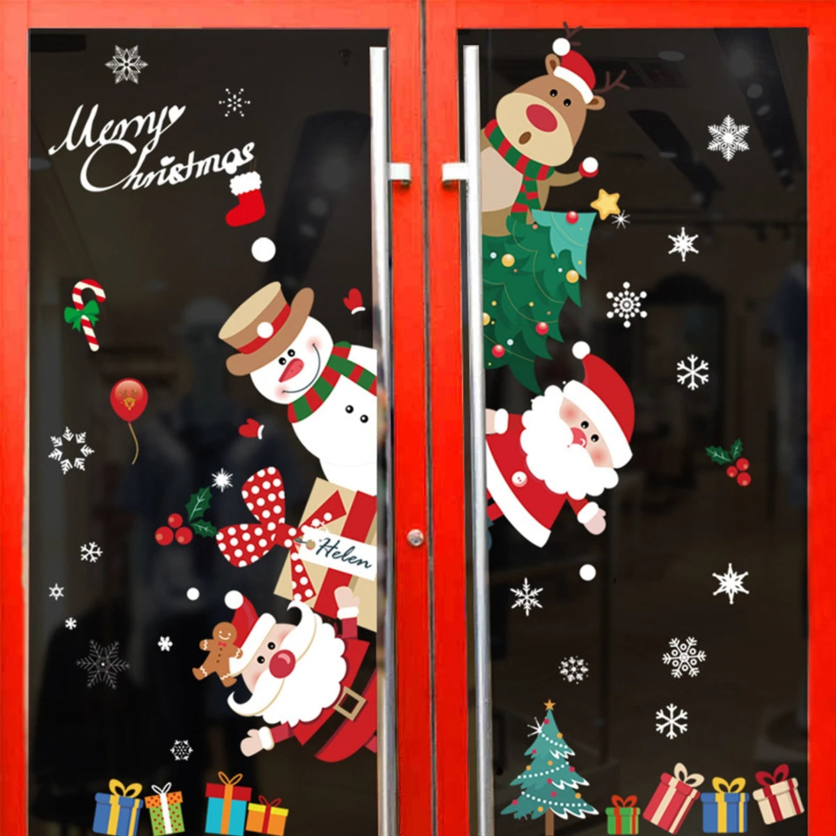 Christmas window stickers with Santa, reindeer, and snowman designs on glass doors