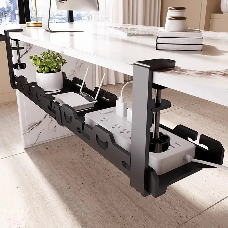 Under-desk power organizer with multiple outlets and ports in a home office setting.