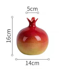 Decorative fruit-shaped vase with measurements on a white background