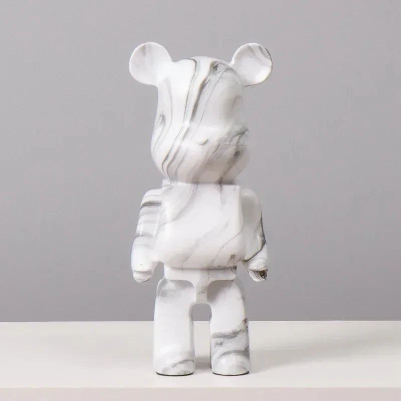 Marble-patterned figurine on a gray background