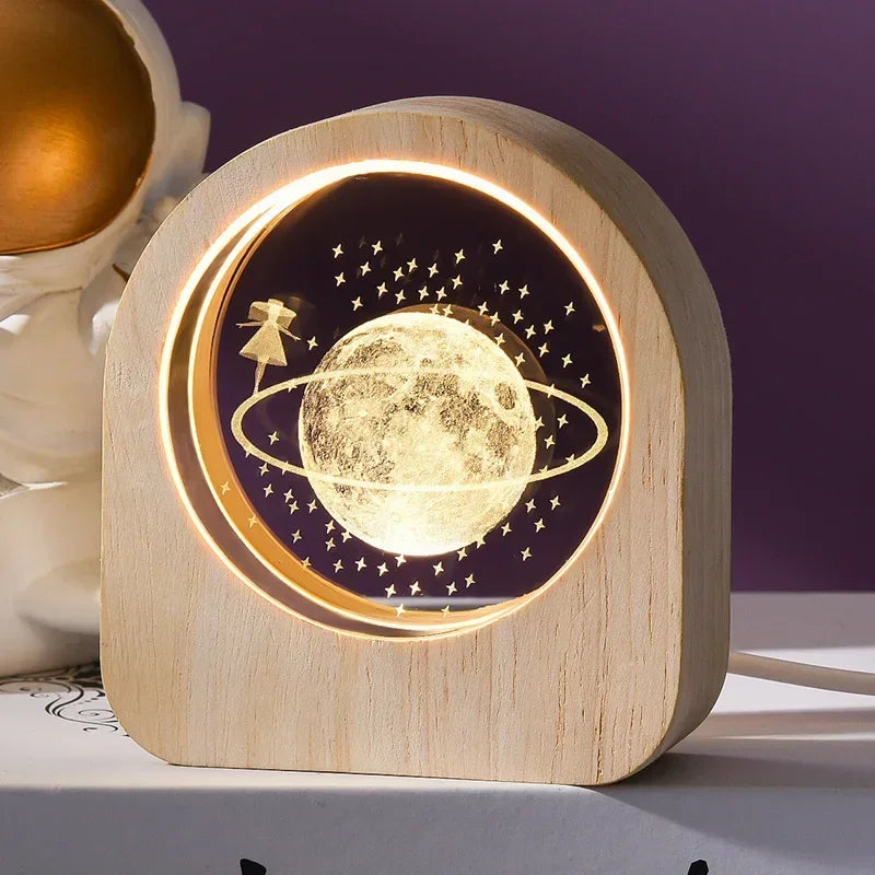 Wooden night light with celestial design on a purple background