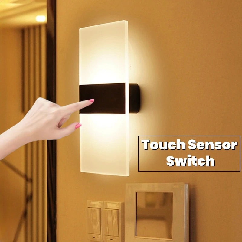 Wall-mounted light fixture with a hand touching it, labeled 'Touch Sensor Switch'.