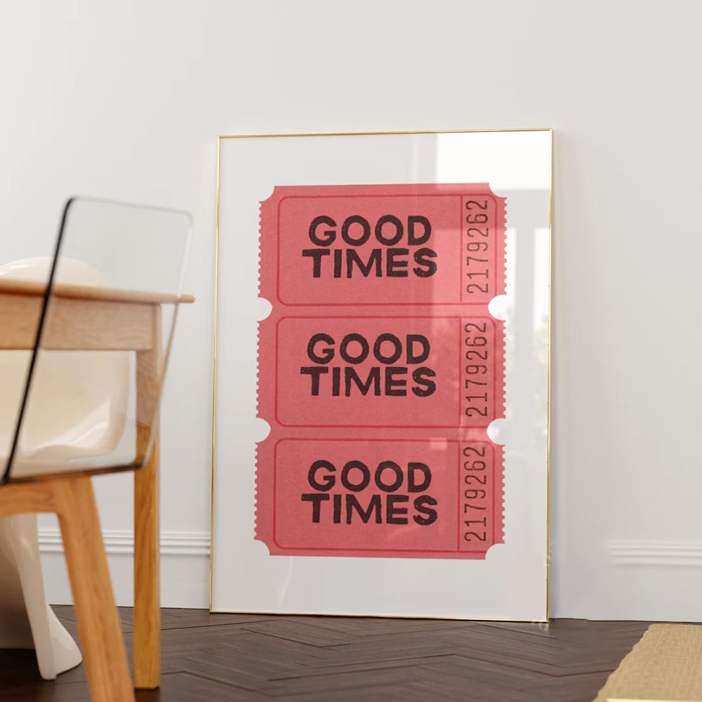 Framed artwork with 'Good Times' tickets design on a white wall.