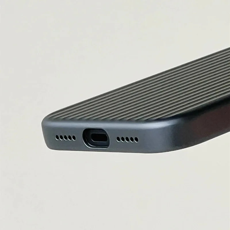 Close-up of a phone case with textural design on a light gray background