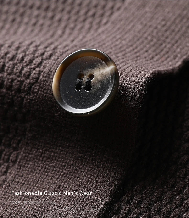 Close-up of a button on a textured brown fabric with 'Fashionable Classic Men's Wear' text.