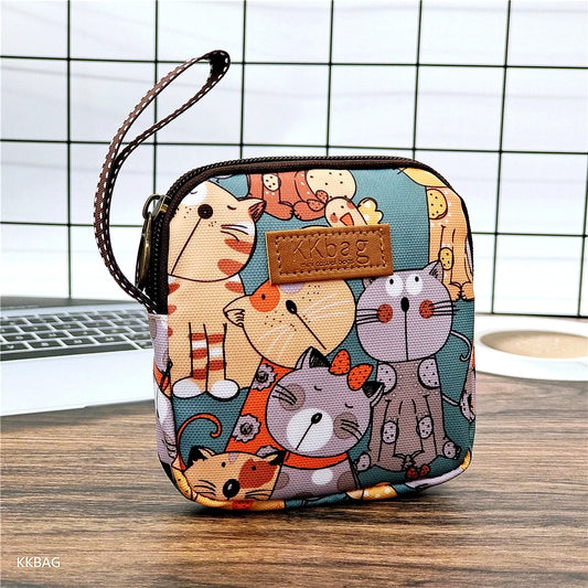 Cute cat coin purse with zipper, compact canvas pouch for cards, coins and travel essentials