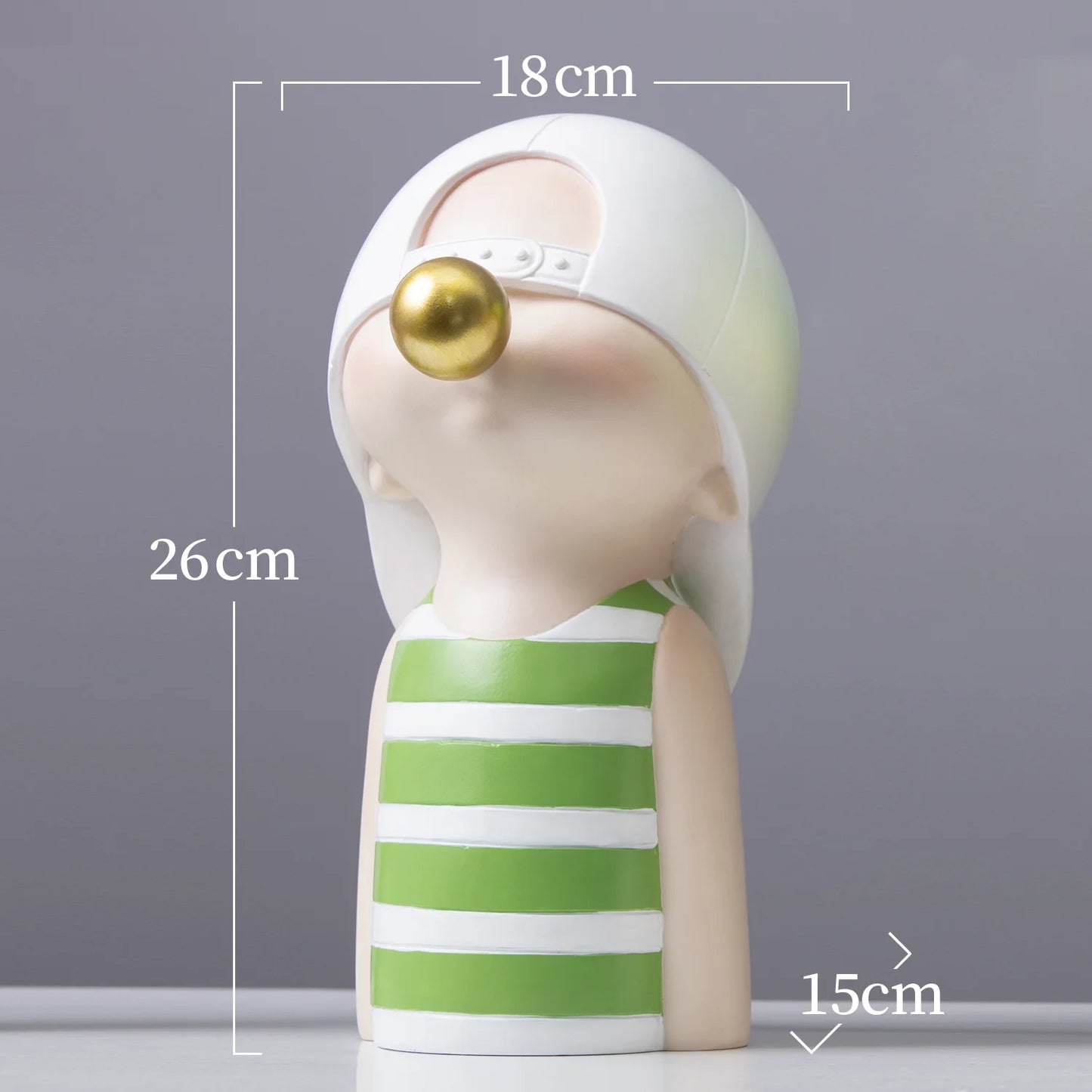 Decorative figurine with green and white striped dress and gold ball on head, shown with measurements against a gray background.