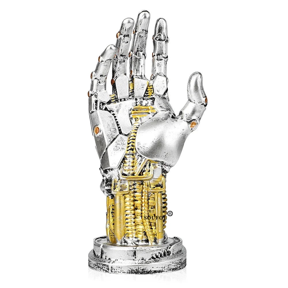 Metallic mechanical hand sculpture on a white background