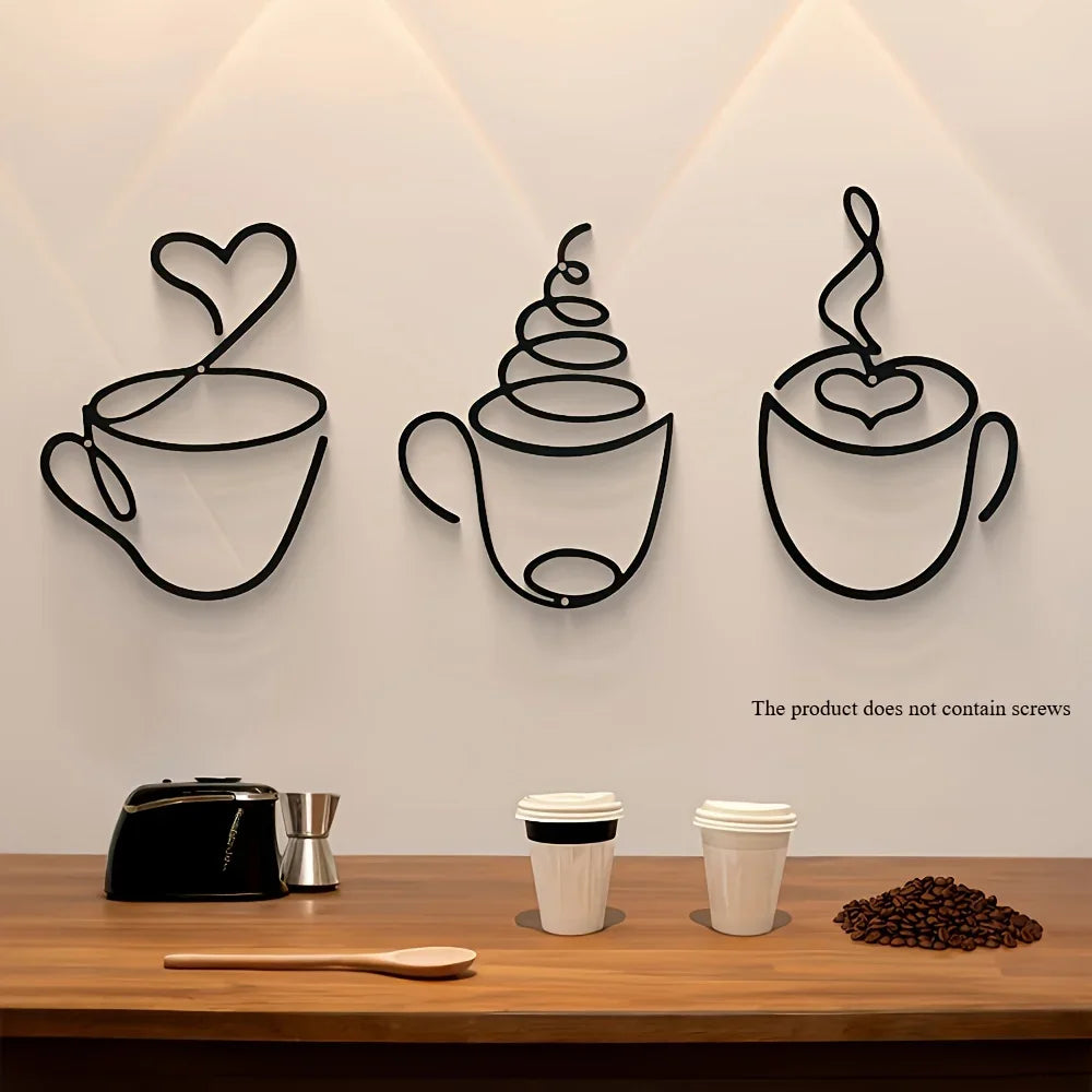 Minimalist metal coffee cup wall art displayed above a wooden counter in a modern kitchen setting
