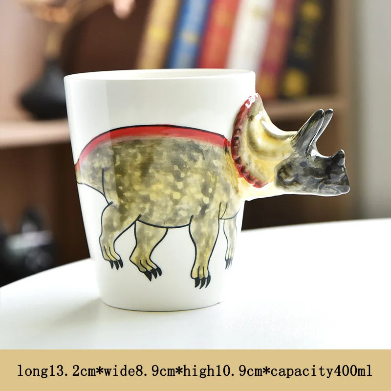 Mug with triceratops design on a table with books in the background