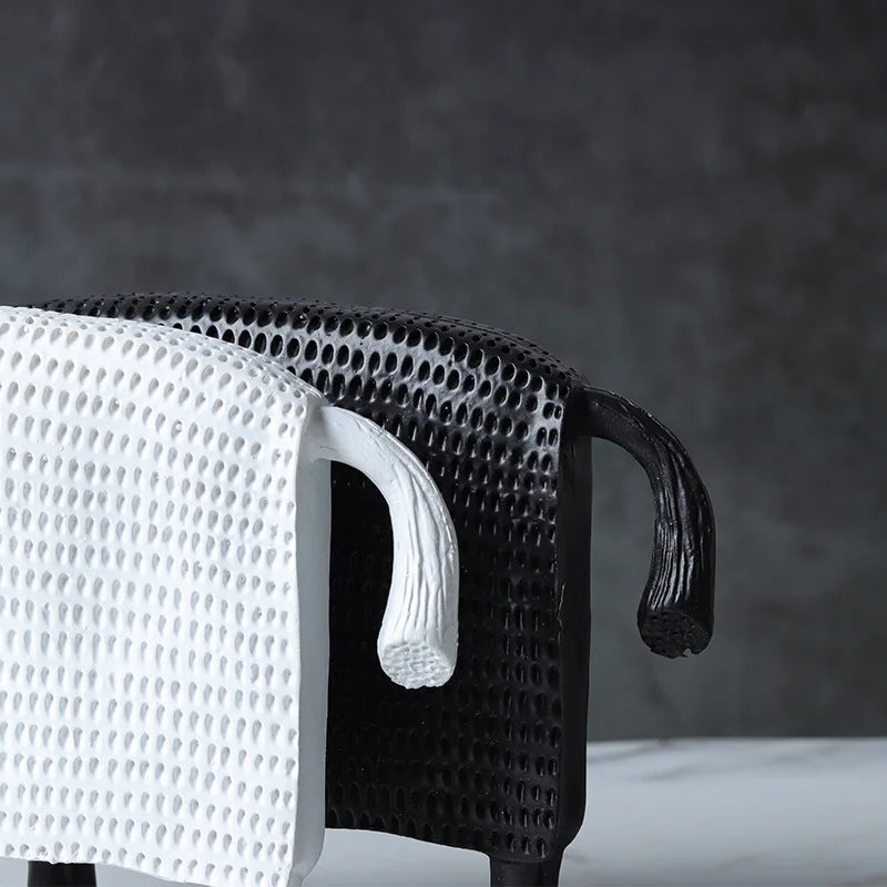 Abstract armoured horse sculpture in black and white resin with textured decorative armour, modern contemporary ornament for home decor.
