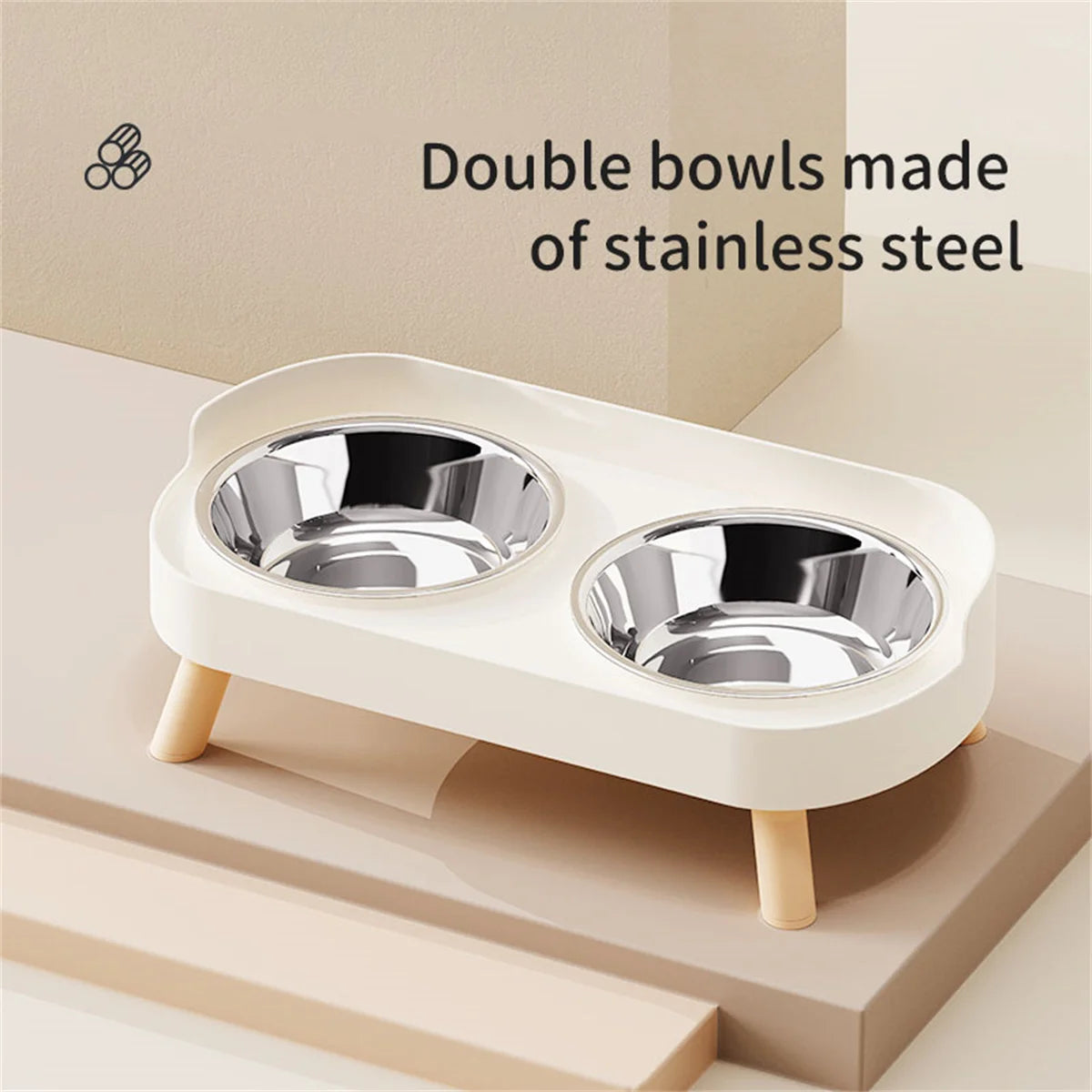 Double pet bowl set with stainless steel bowls on a beige stand, labeled 'Double bowls made of stainless steel'.
