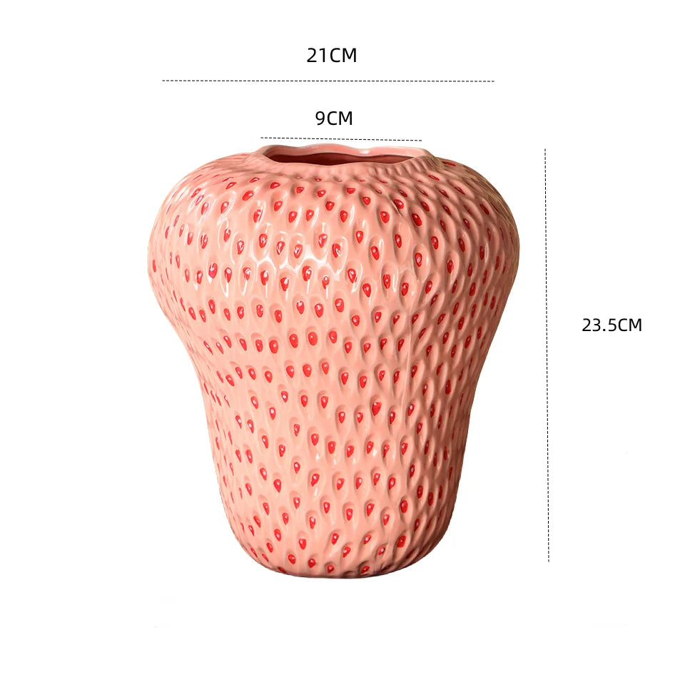 Pink textured vase with dimensions on a white background