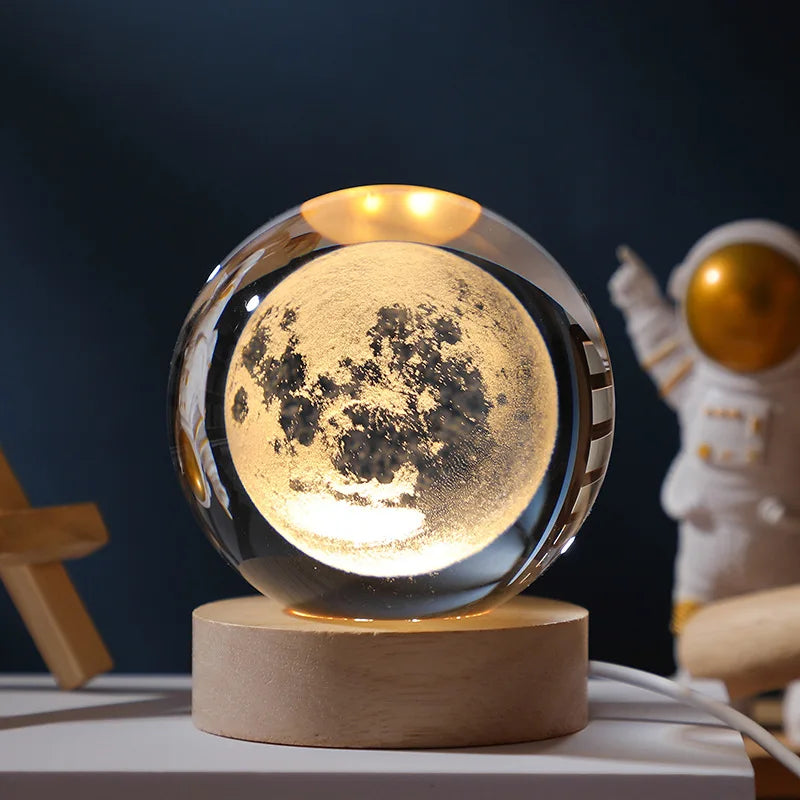 Moon lamp with wooden base on a dark background